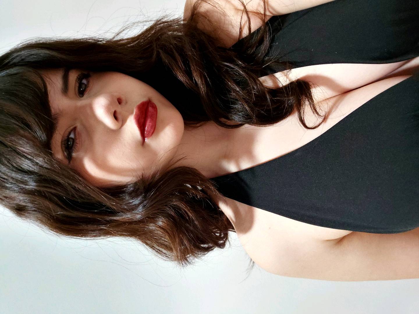 Woman smiling during a private video chat